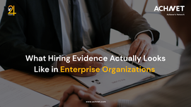 Enterprise hiring team reviewing structured interview evidence and hiring data